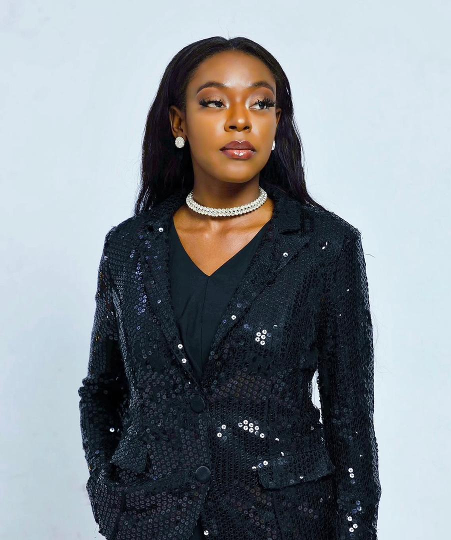 Portrait of Ella Adoki, CEO of Derme Pro Group