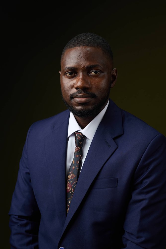Portrait of Ganiu Anifowoshe, Head of Research at HEvolve Foundation